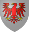 D'argent à l'aigle éployé de gueules, membré et becqué d'or